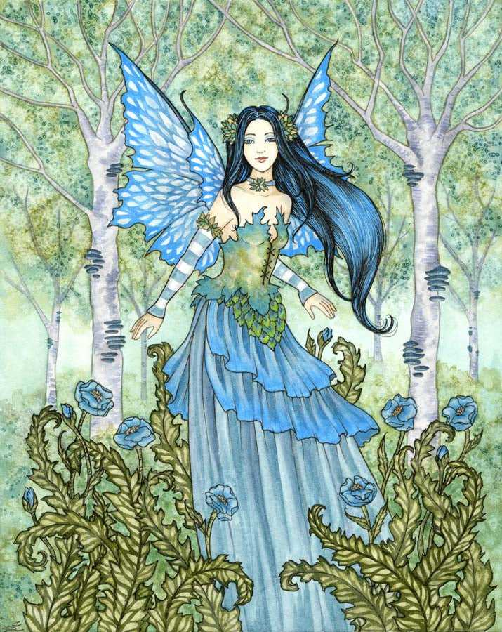 Fairy with blue wings and flowing dress in forest setting