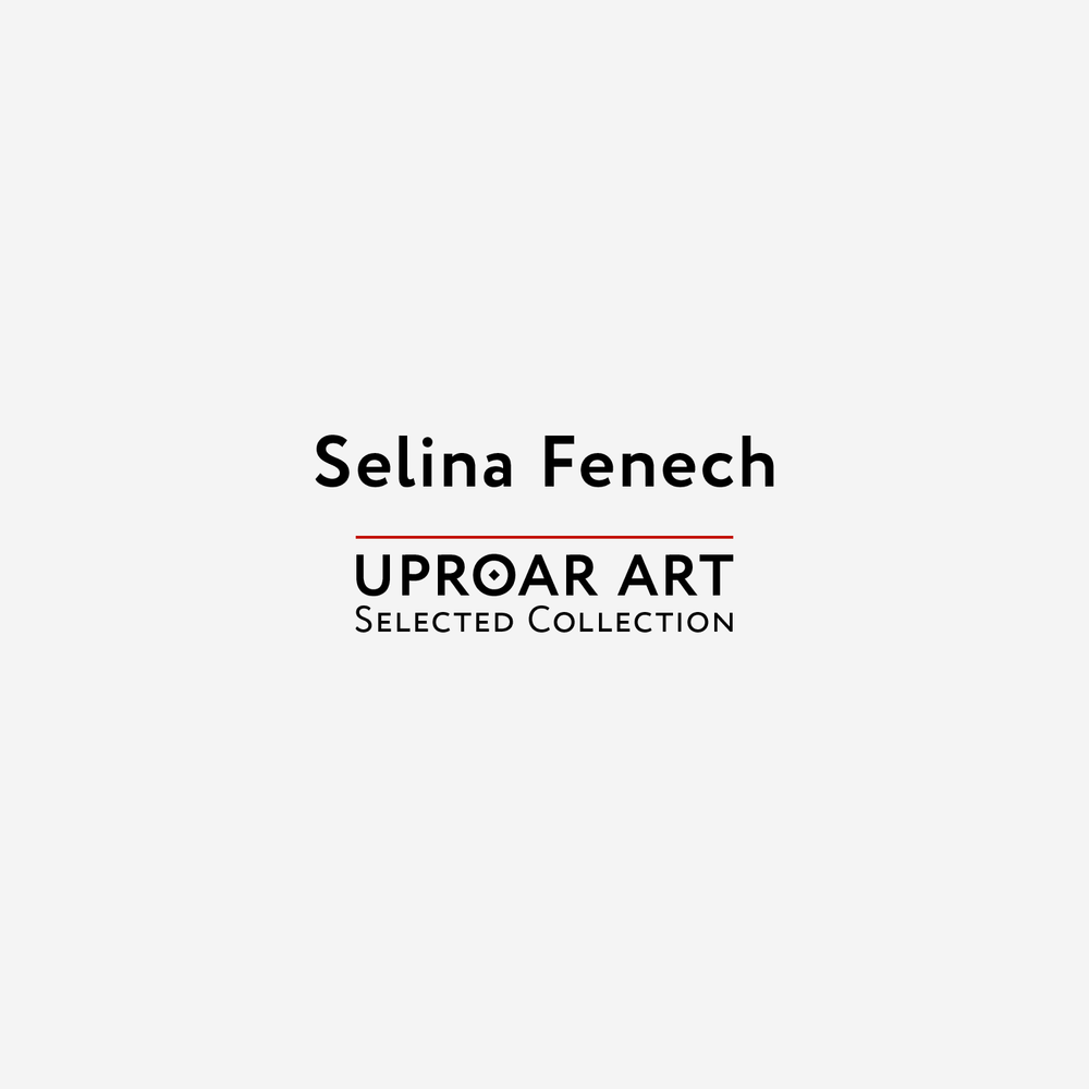 Cover of Selina Fenech art prints collection featuring bold black text on a light gray background with red and black accents, promoting fantasy artwork for collectors.