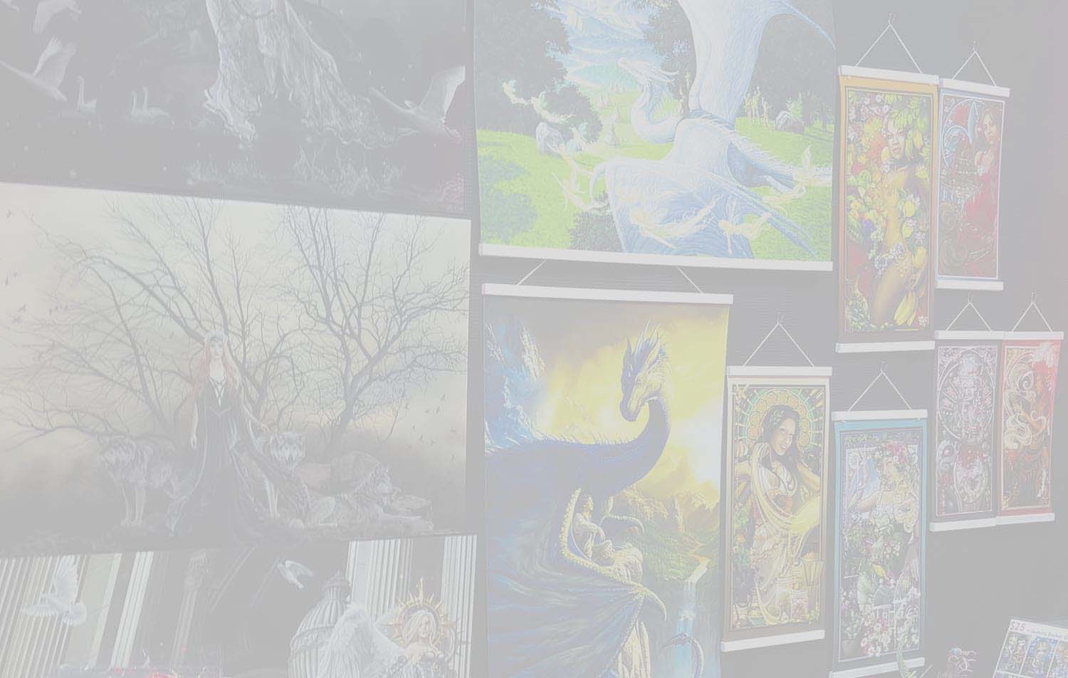 Wall of art on a light gray background. Cover photo for fantasy art online gallery by Uproar Design & Print.