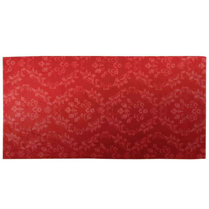 Red fabric with floral pattern on a white background