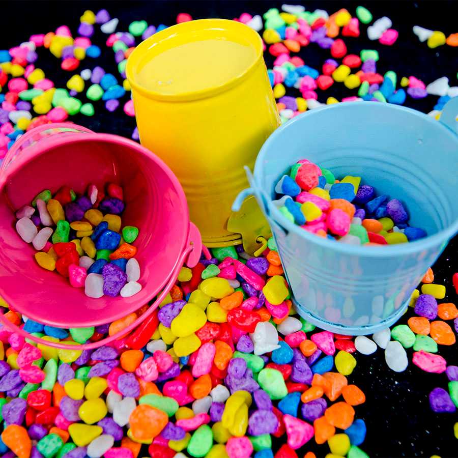 Colorful pebbles and painted kegs