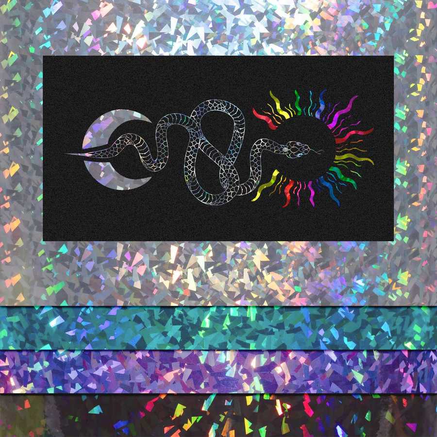 Decorative design with a snake, moon, and sun on a black background with a colorful, glittery pattern.